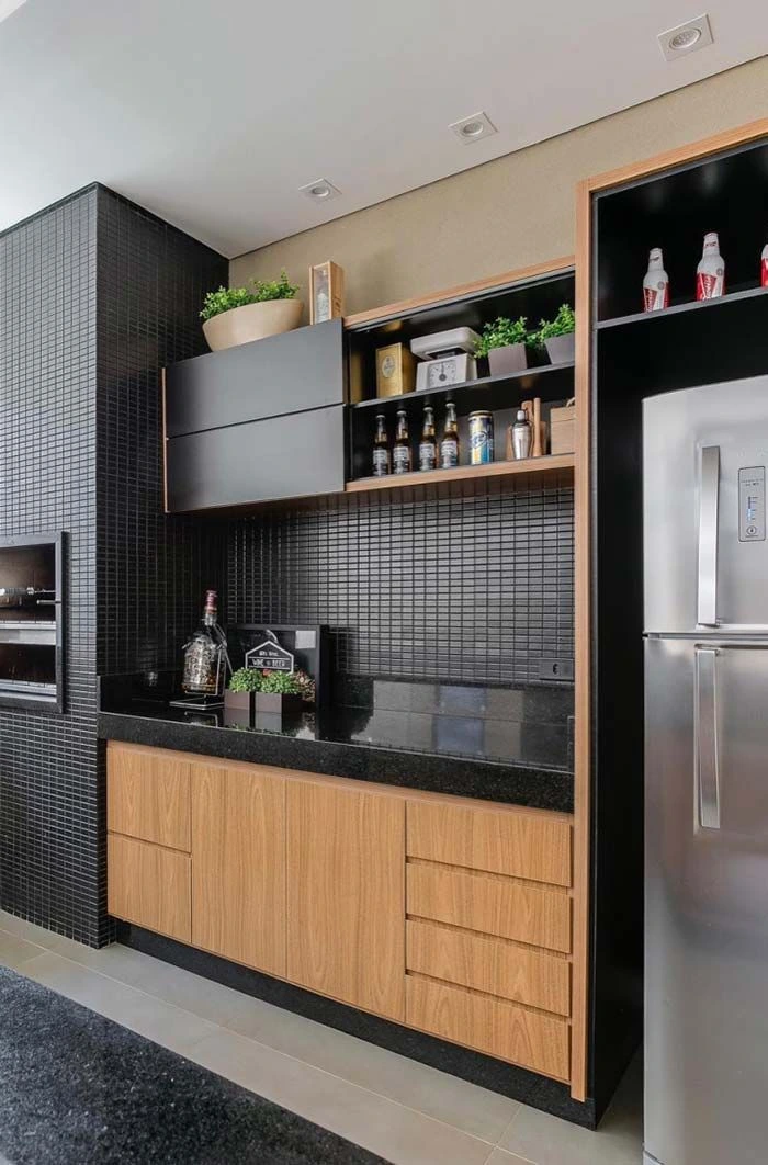 Home 31 Área gourmet planejada com design sofisticado.